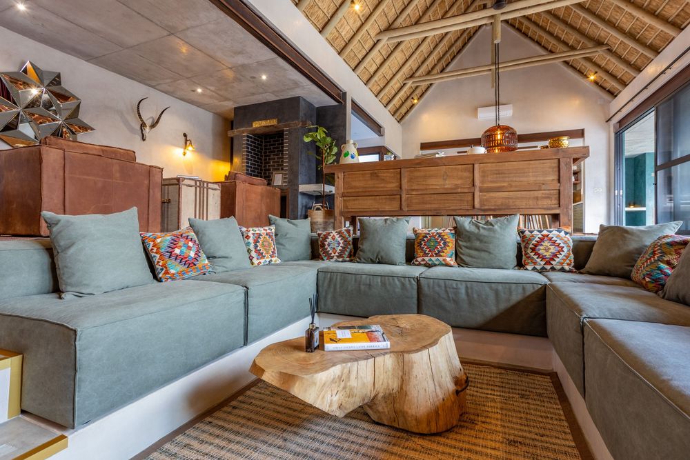 Spacious lounge area with high ceilings and contemporary decor