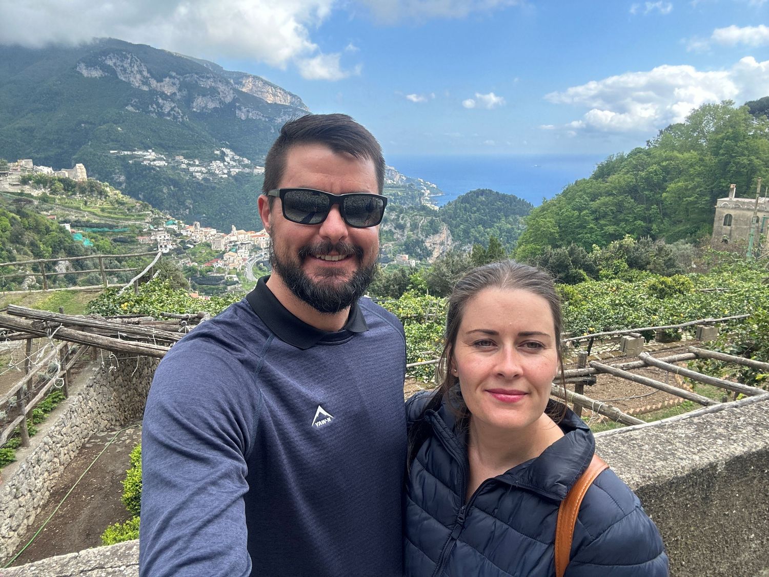 Ruan and his wife enjoying a scenic view in Ravello, Italy