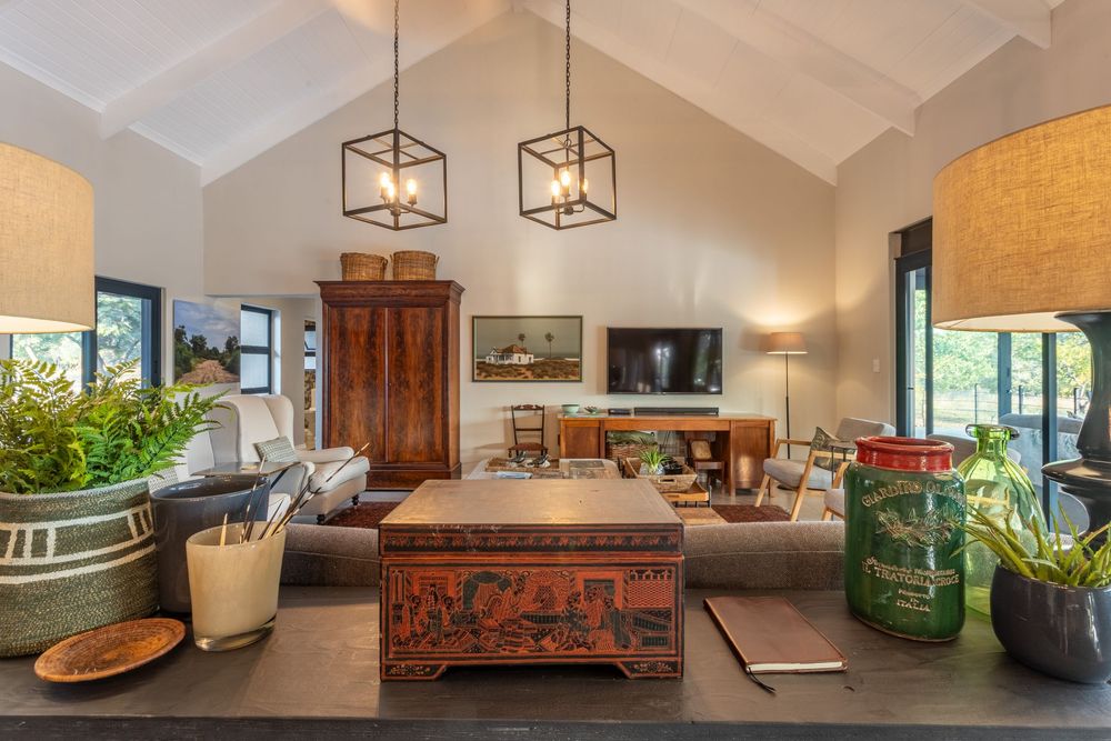 Spacious lounge area with high ceilings and contemporary decor
