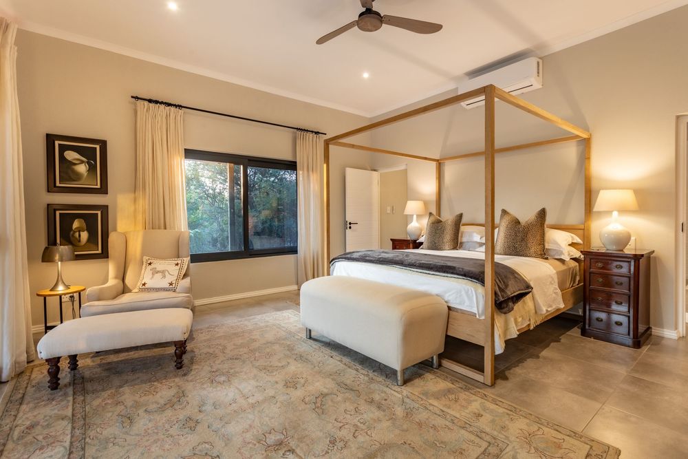 Bedroom suite with balcony view over the bushveld